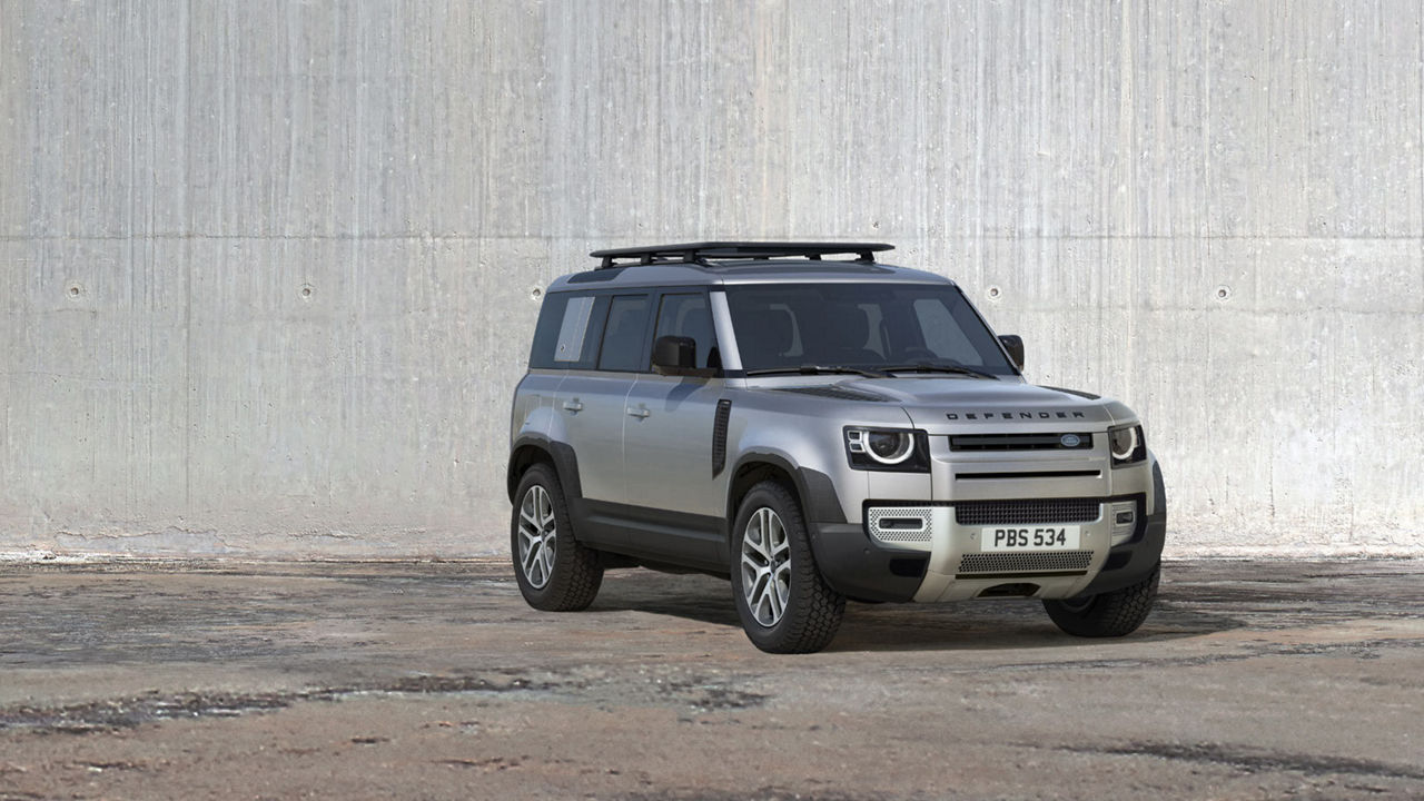 Land Rover Defender in grey background