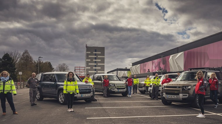 Land Rover staff in parking spot