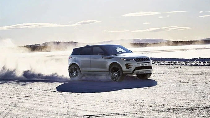 Range Rover Evoque driving in sand