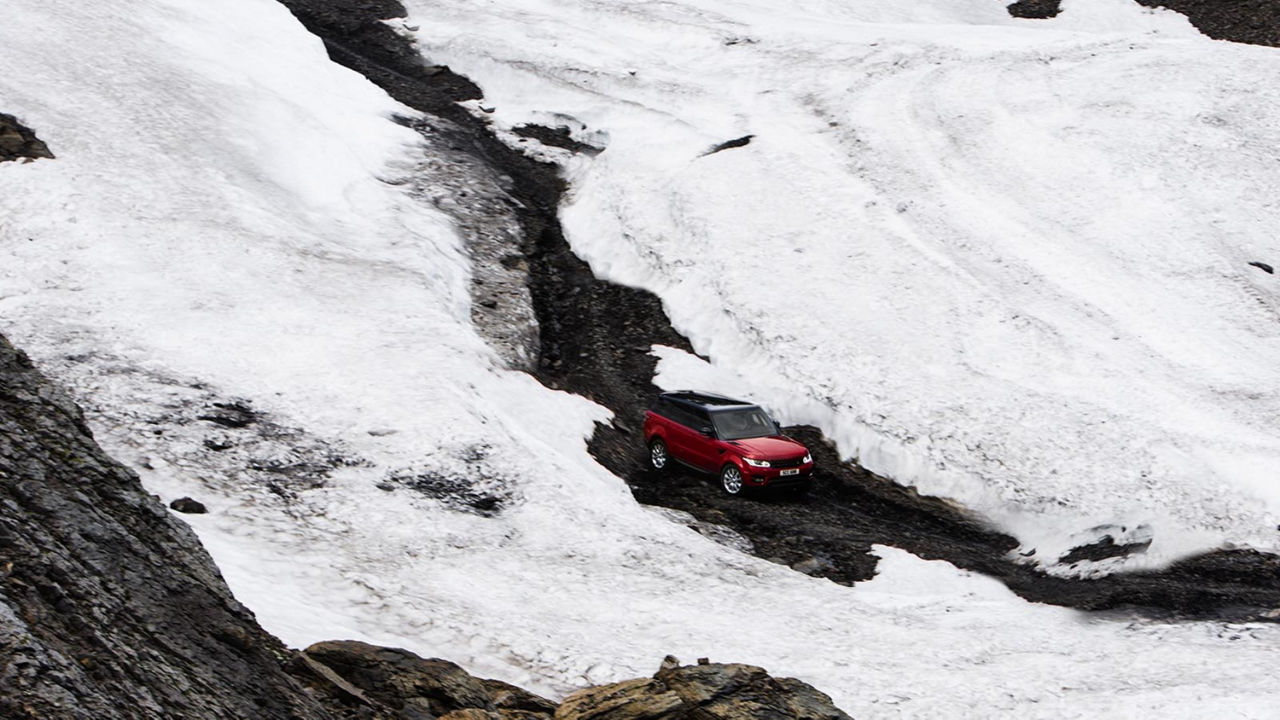 Range Rover top view driving in snow