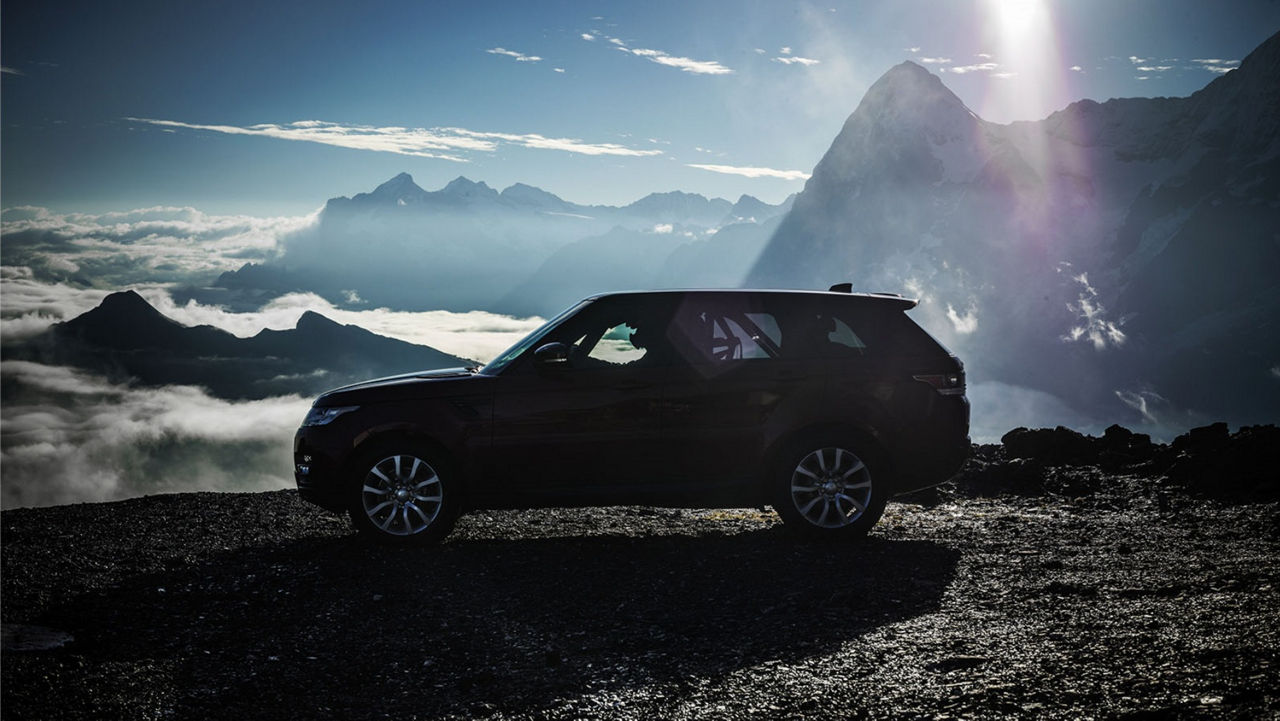 Land rover is parked in mountain landscape