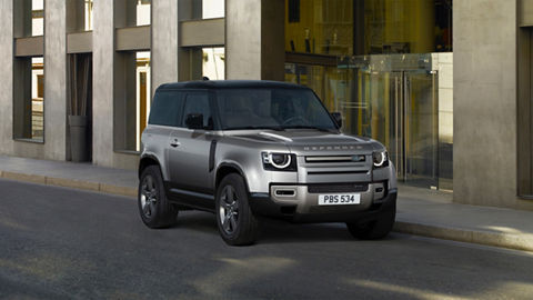 Land Rover Defender near the building 