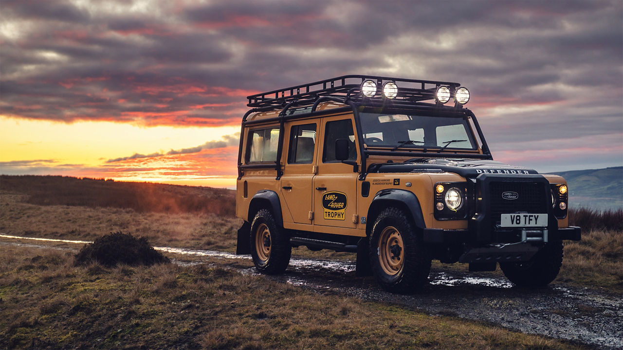 Defender trophy parked on mountain road