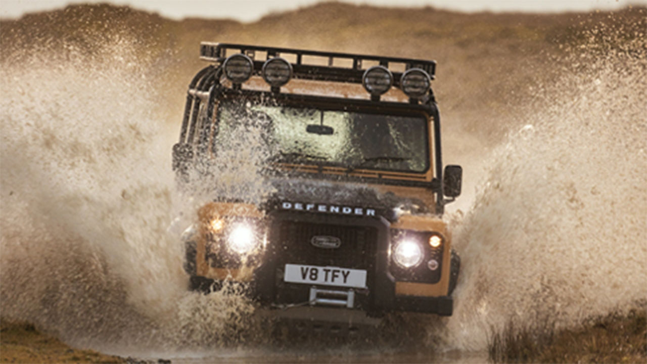 Defender trophy splashing water 