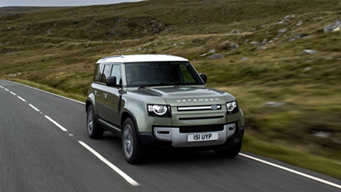 Defender rolling on the road