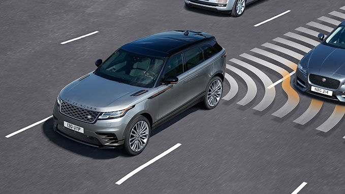 Range Rover is driving getting info for close coming vehicles