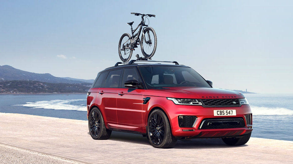 Range Rover is carrying a bicycle