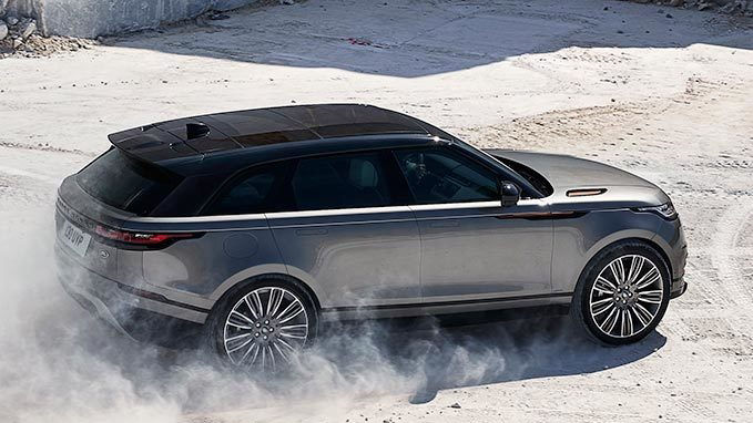 Range Rover is driving in rocky surface