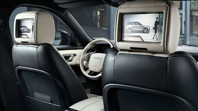 Range Rover screens on the front seats' back