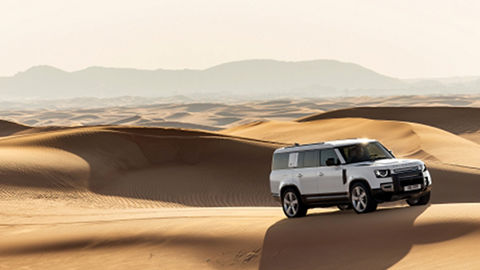 DEFENDER 130 FUJI WHITE DUBAI DUNES