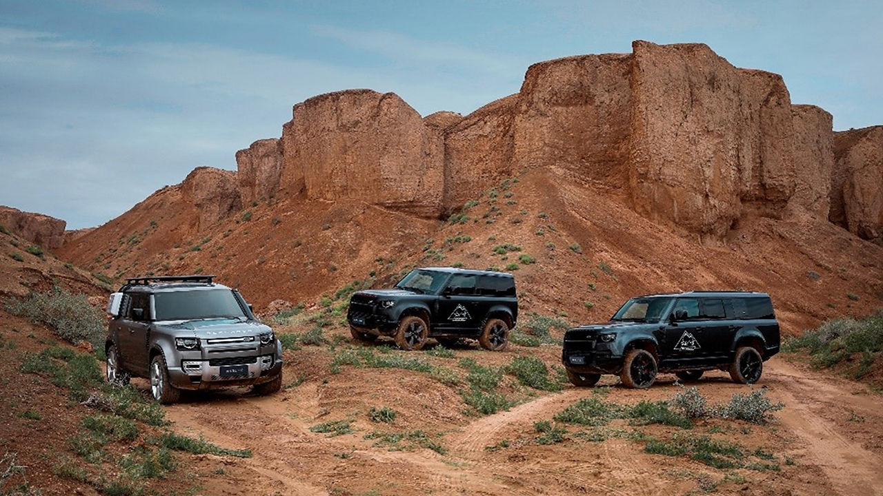 Defender on desert mountain