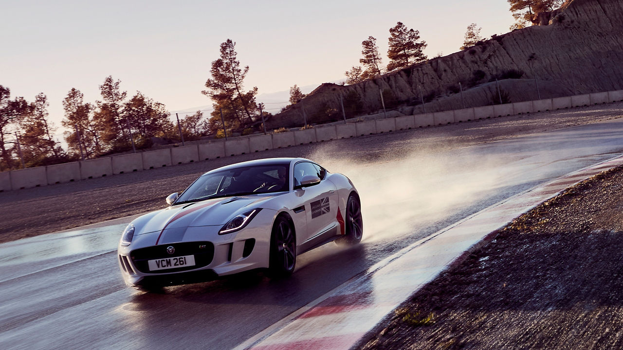 Jaguar F-Type on racing track testing tire skid and collision test