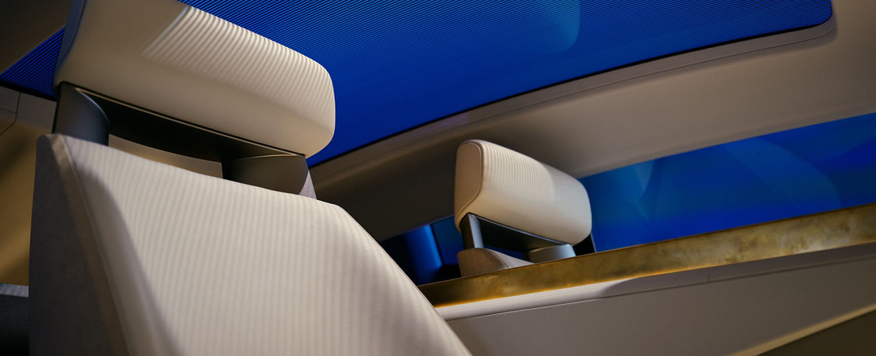 Car Interior view showing headrests and panoramic sunroof.