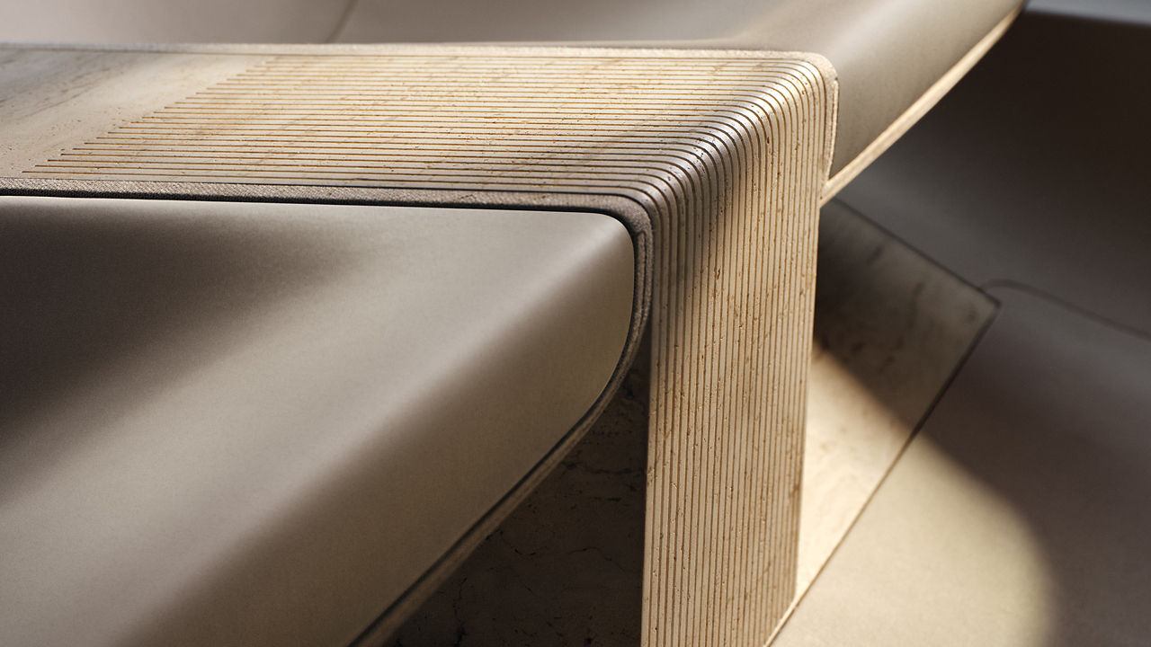 Close-up view of a modern wooden table with smooth, curved layers.