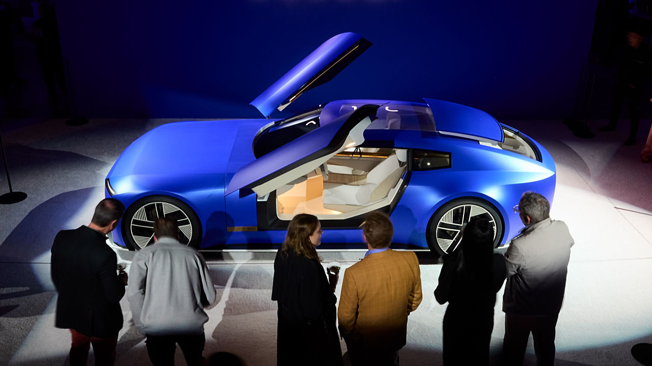 Future Jaguar side view with public