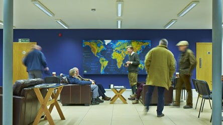 Men conversating in a room