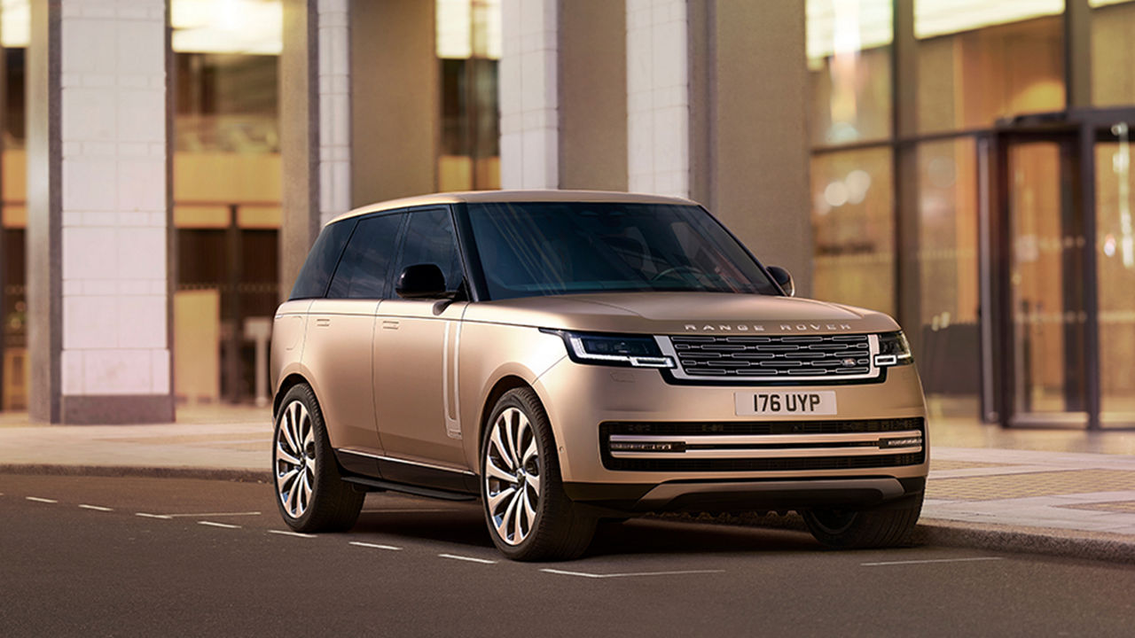 New Range Rover parked on a road