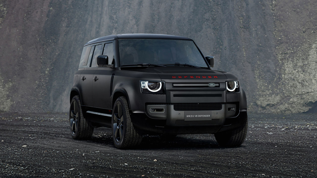 Defender standing on road