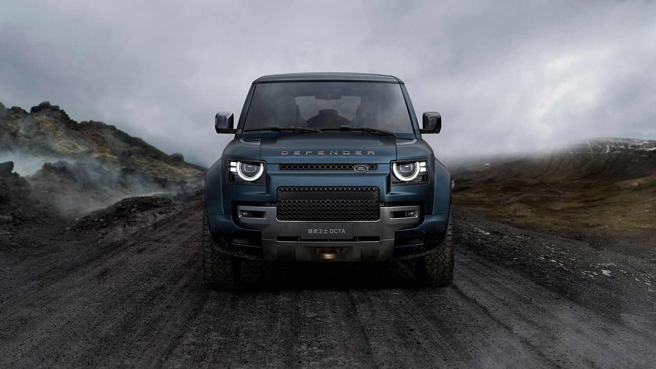Defender is off roading in the mud