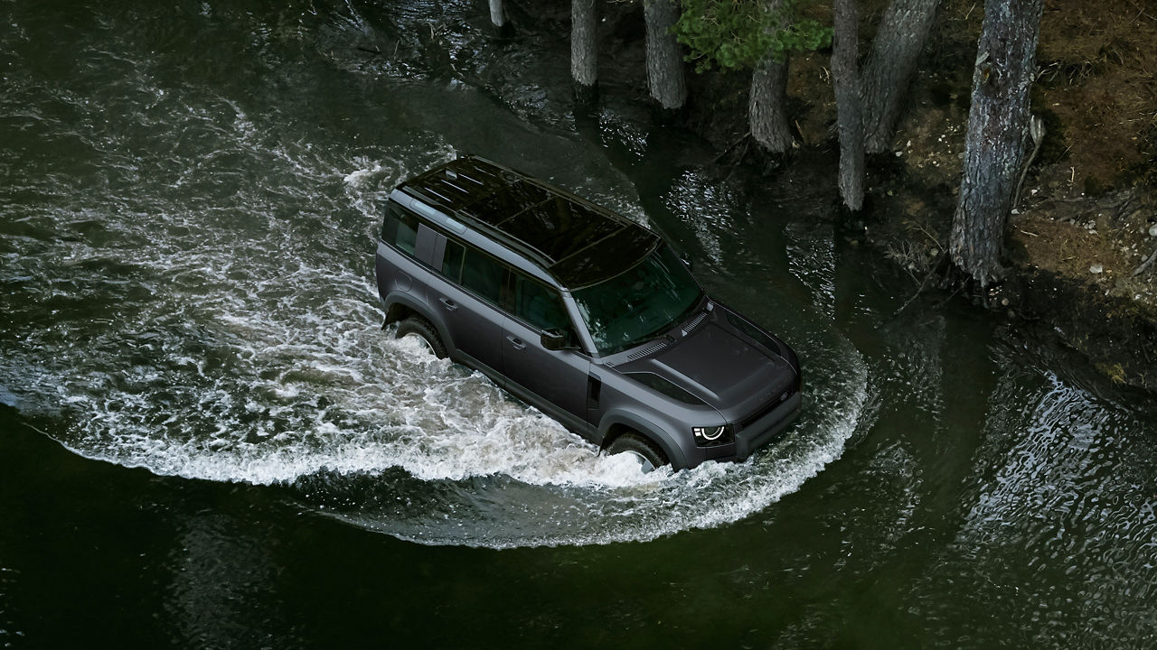 Defender saling in water