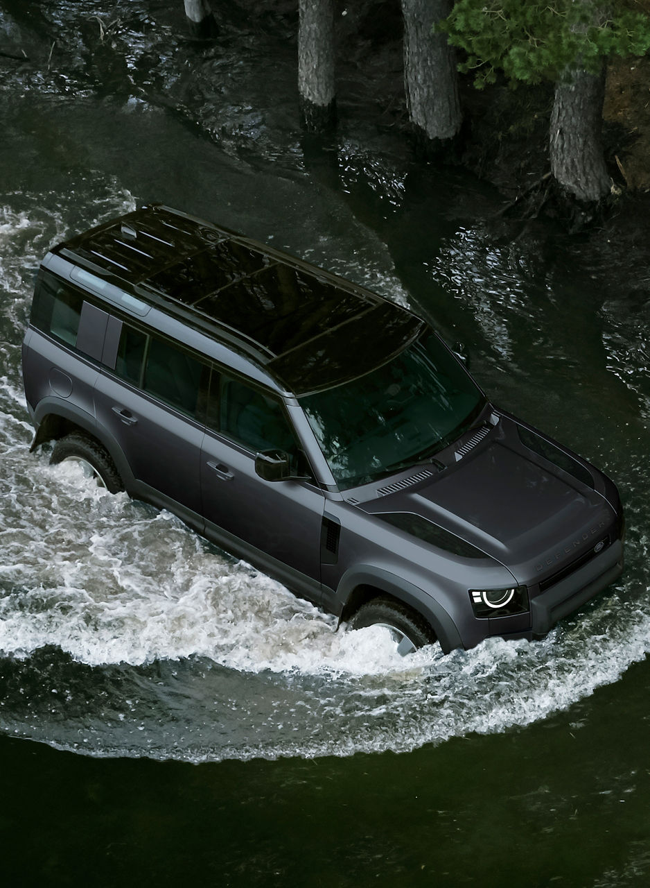 Defender sailing in water