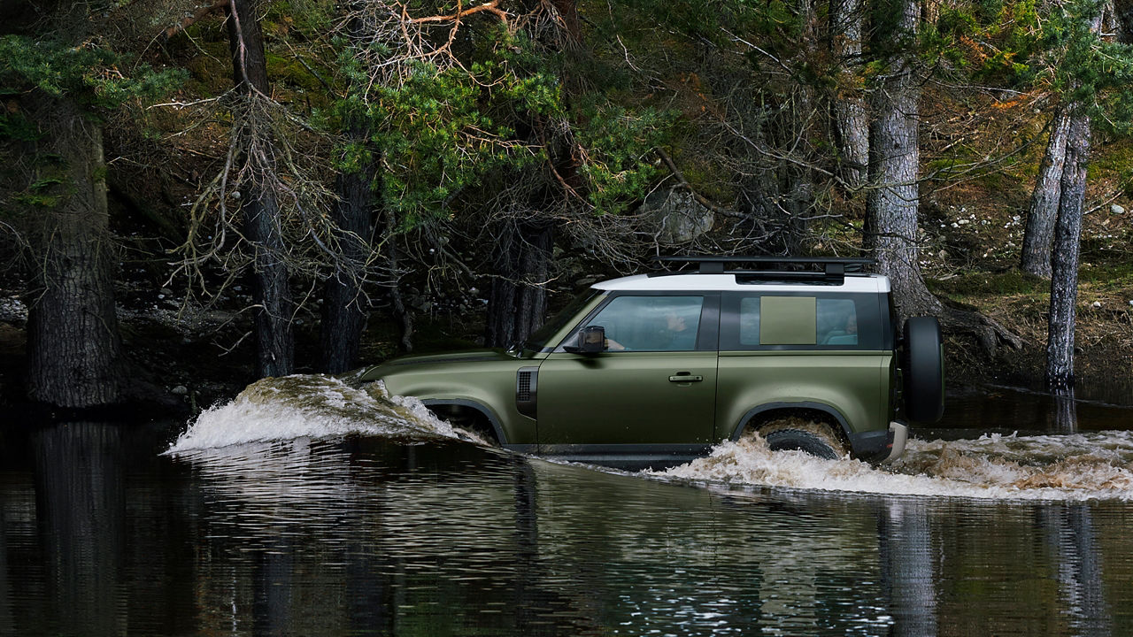 Defender saling in water