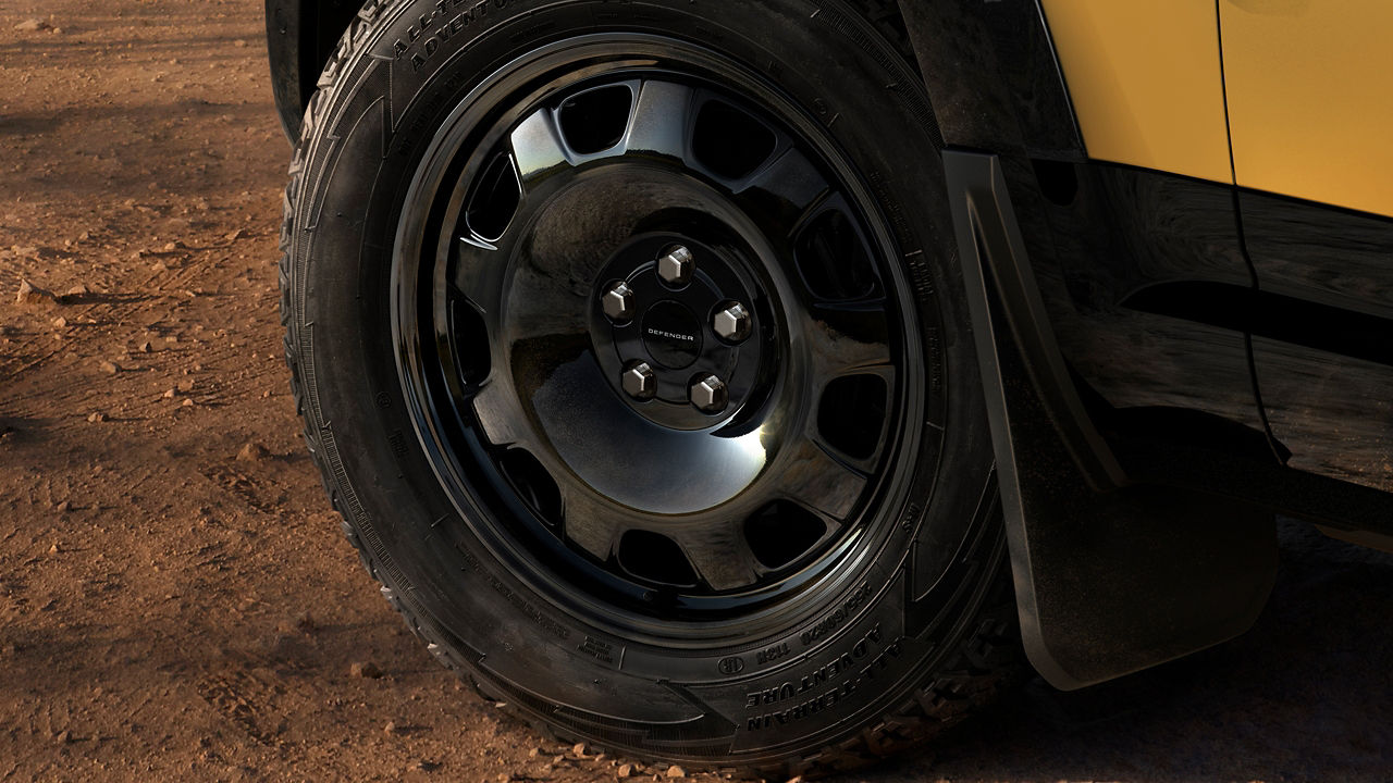 20-inch Gloss Black wheels fitted with all-terrain tyres.
