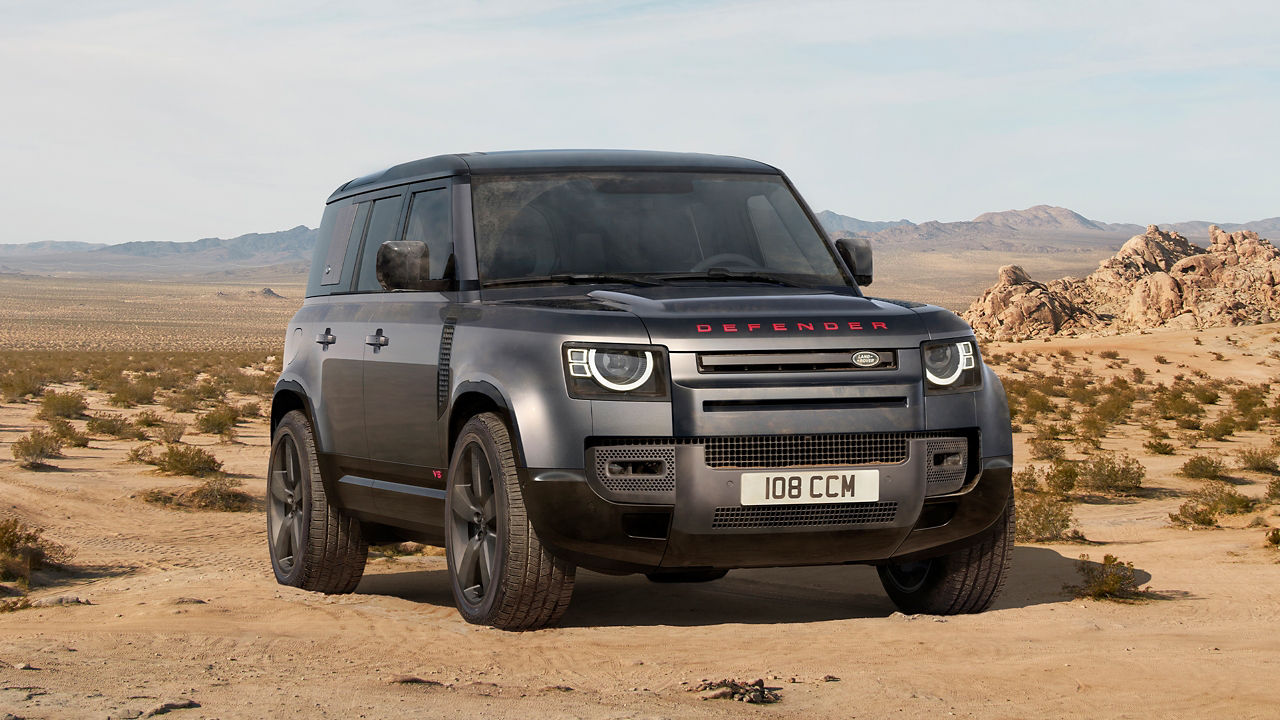 Defender standing in desert area