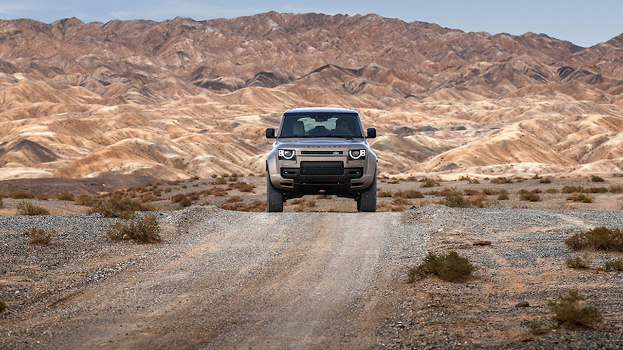Defender driving in hills