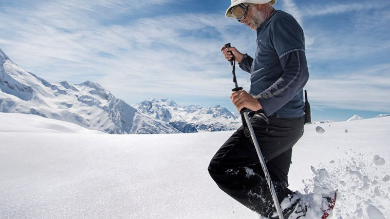 Man Hiking in the Snow 