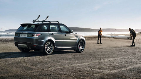 Range Rover parked on beach