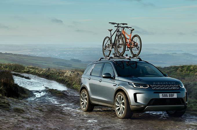 Range Rover Discovery with roof mounted bicycle rack