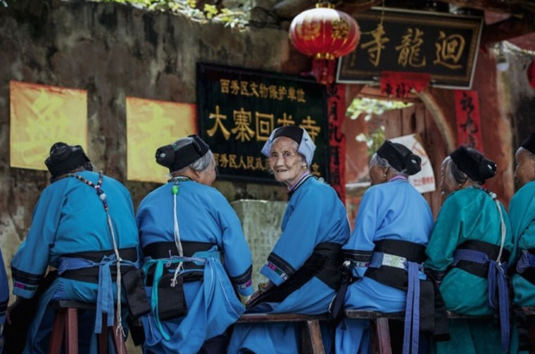 Locals dressed in blue