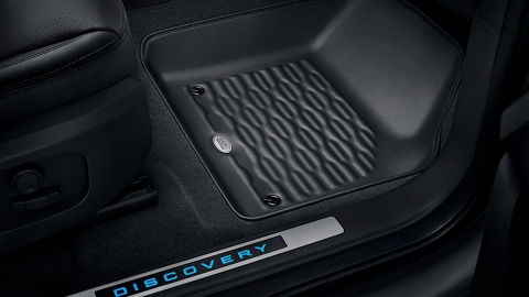 Close up of floor cover and Discovery badge