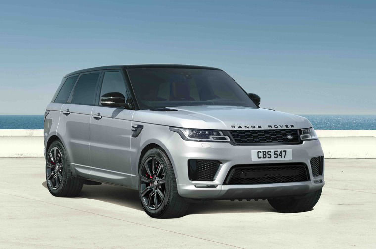Range Rover parked by sea