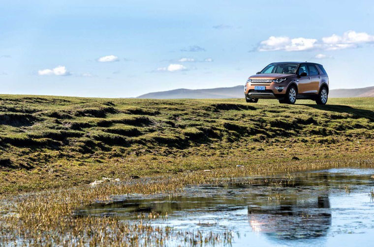 Rangre Rover in a field