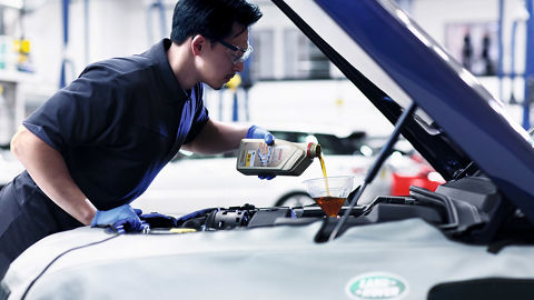 Topping up with Castrol Oil