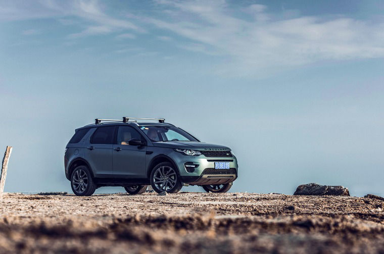 Land Rover Discovery parked on rocky terrain