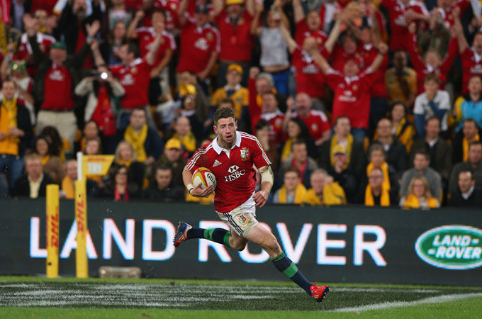 Rugby player running on field