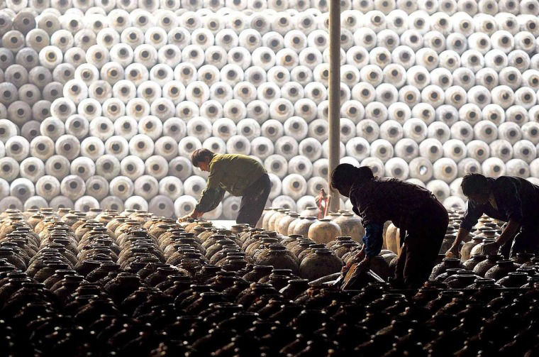 Rice wine being stored in clay jars