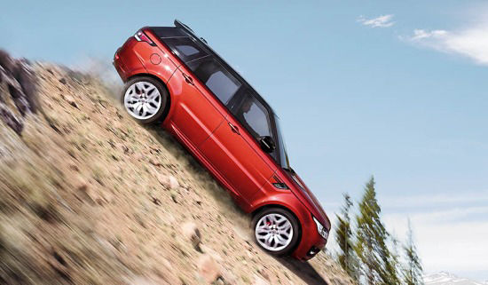 Range Rover driving down steep hill