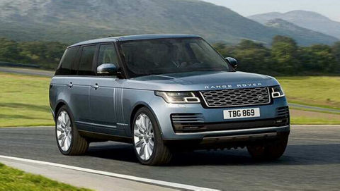 Range Rover in grey driving 