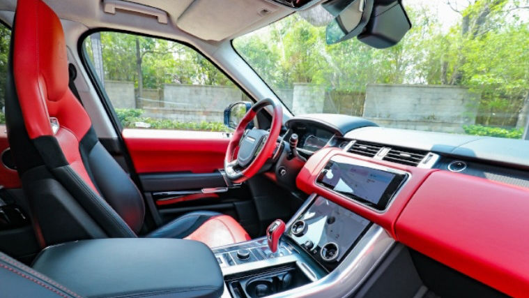 Red and black upholstered vehicle interior