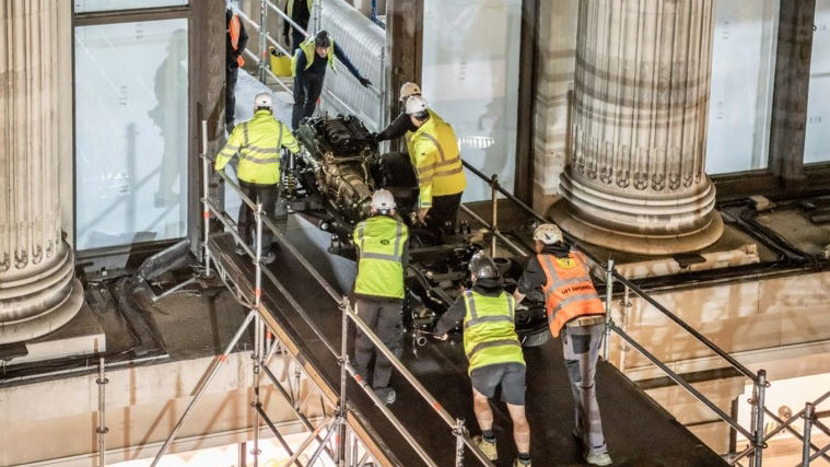 Engineers pushing Land Rover Defender Works V8 chassis