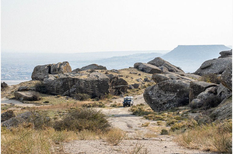 Land Rover Series I in mountain landscape