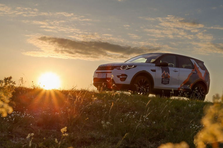 Range Rover in field