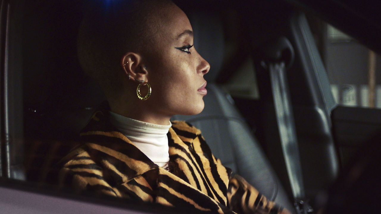 Closeup view of girl seating in car