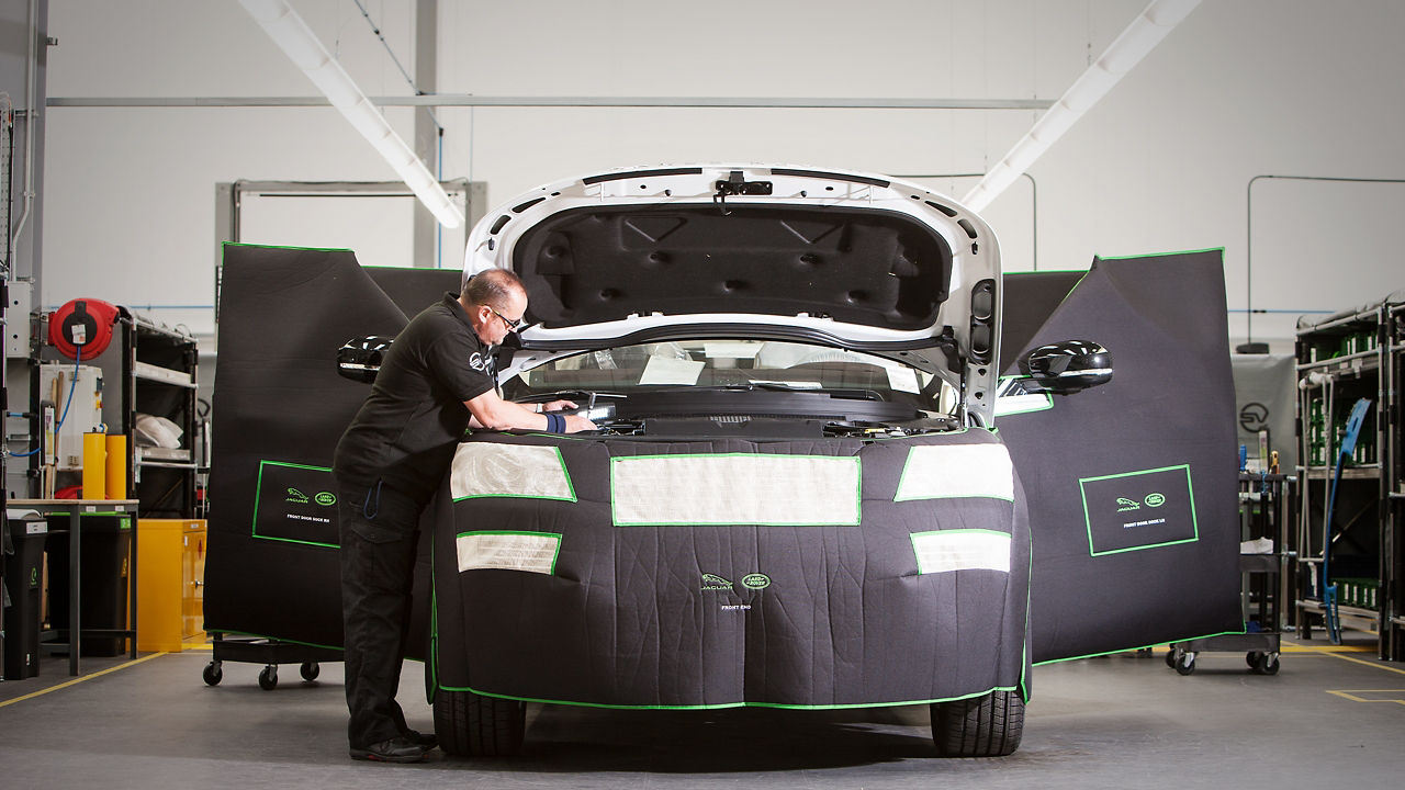 Range Rover car service, repair and professional service male worker