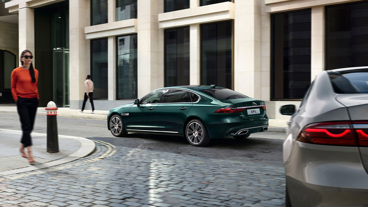 Jaguar XF driving onto the City road