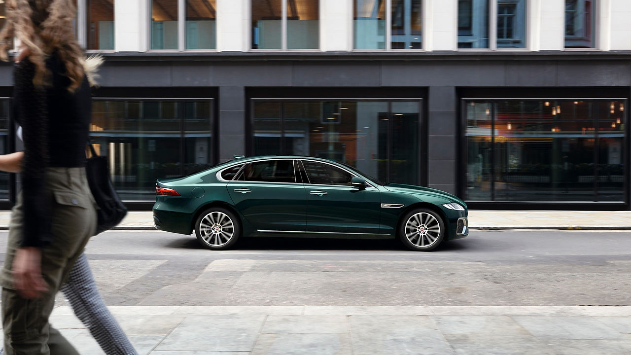 Jaguar XF driving on the city road